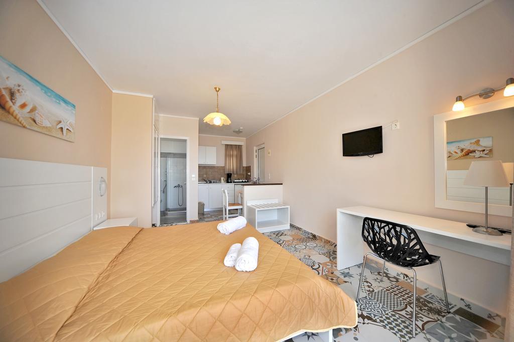Byron Apartments Τιγκάκι Δωμάτιο φωτογραφία